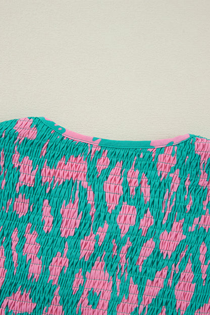 Grünes abstraktes Kleid mit Puffärmeln und geknotetem Halsausschnitt