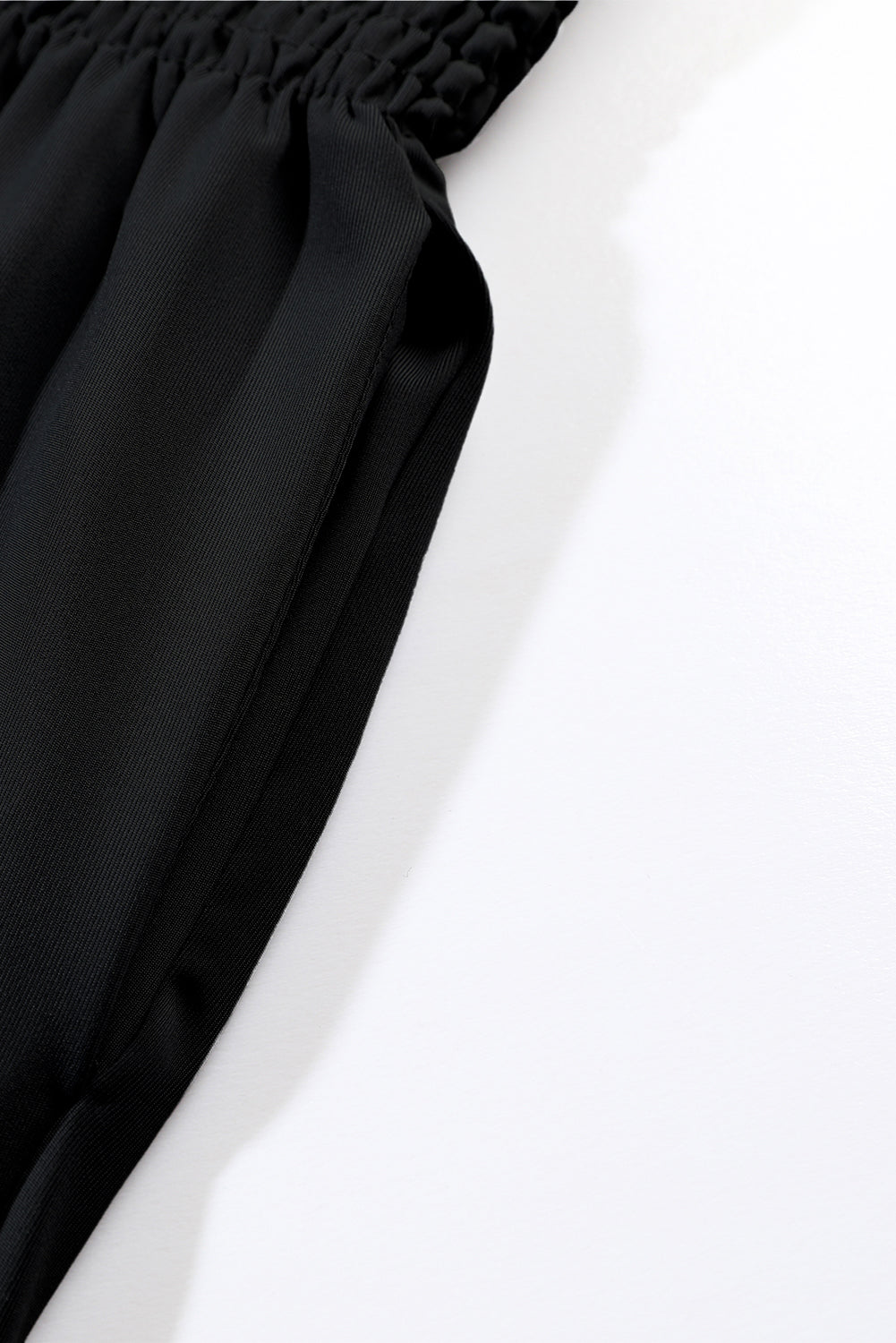 Schwarze gesmokte jogginghose mit hoher taille