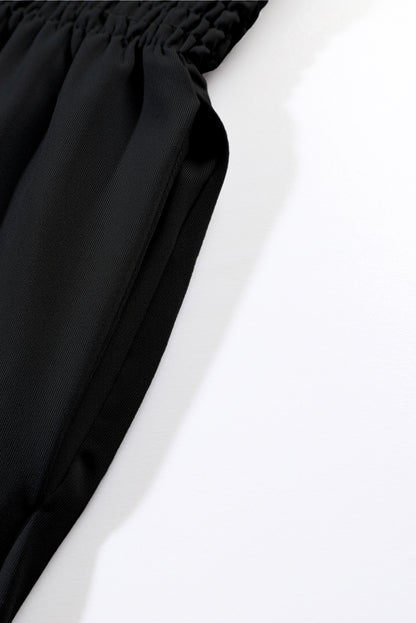 Schwarze gesmokte jogginghose mit hoher taille