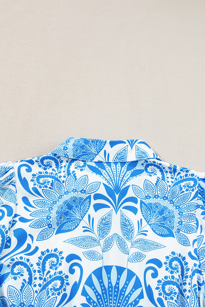 Himmelblaues retro-blumendruck-minikleid mit geraffter taille und kordelzug