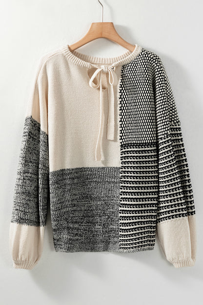 Schwarzer neutraler colorblock pullover zum binden