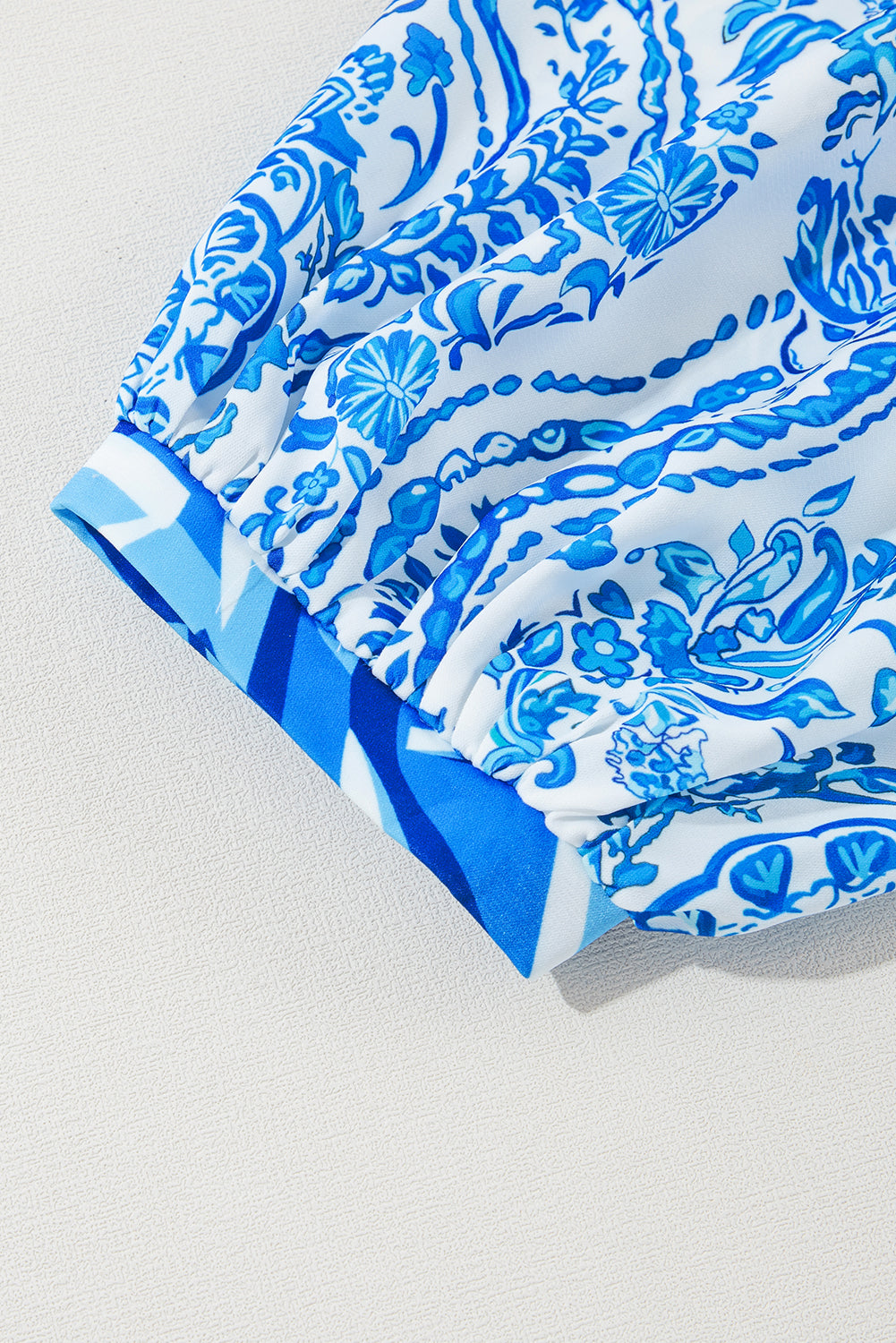 Himmelblau bohemian print puff sleeve tied v neck flared mini dress