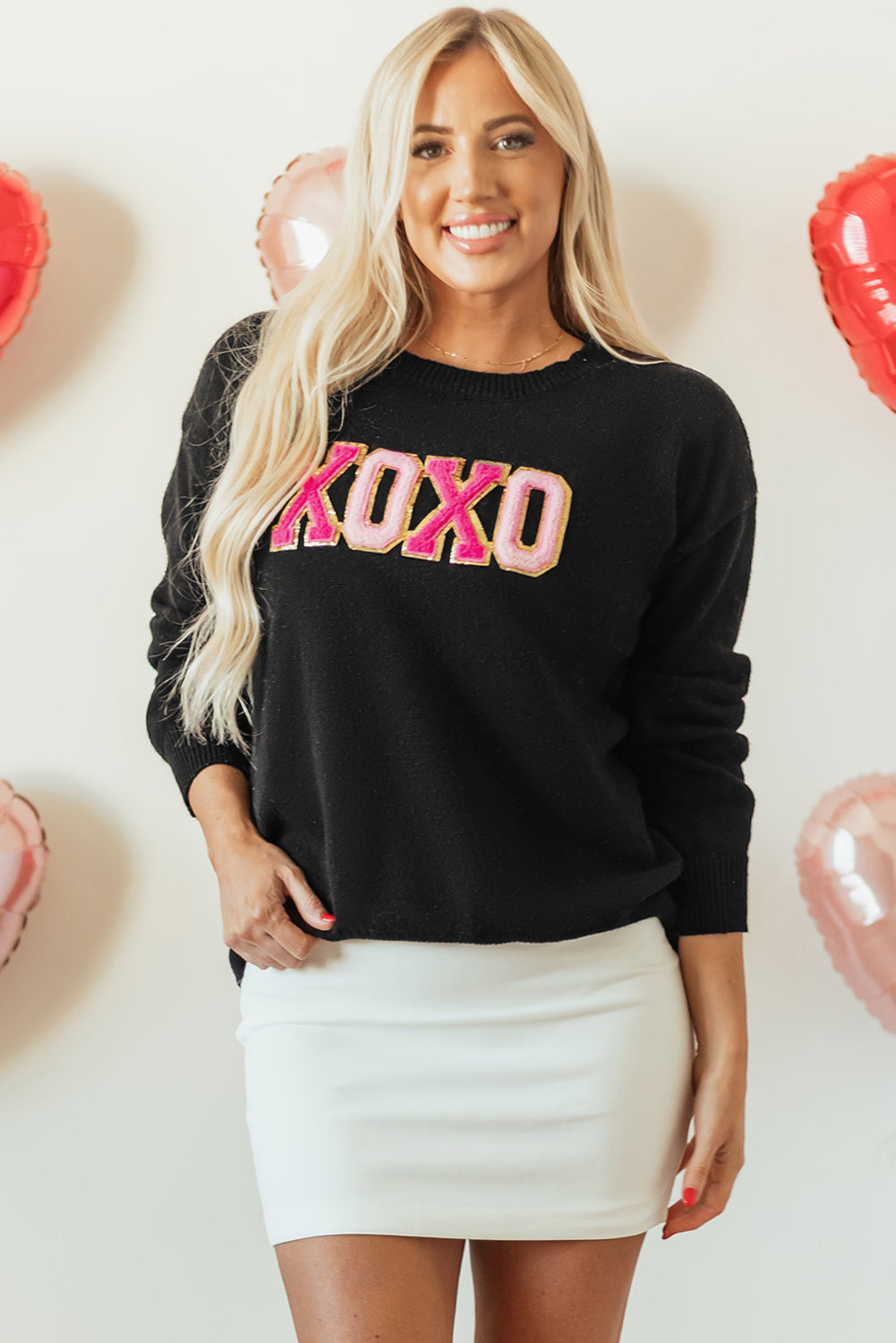 Schwarzer xoxo glitter print rundhalsausschnitt casual pullover