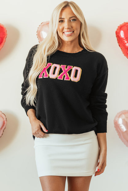 Schwarzer xoxo glitter print rundhalsausschnitt casual pullover