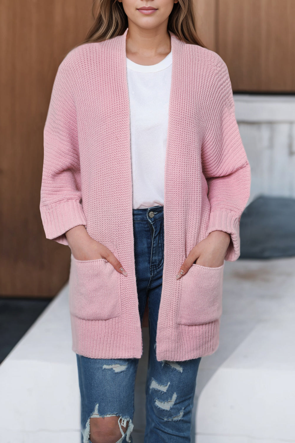 Rosa übergroßer pullover mit umgeschlagenen ärmeln cardigan