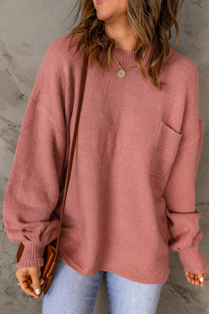 Unifarbener pullover mit puffärmeln und taschen