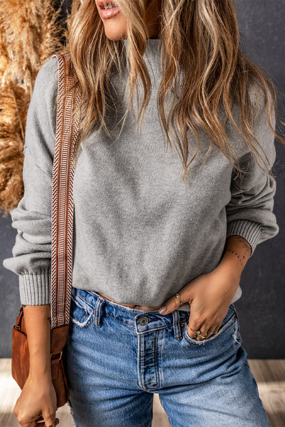 Grauer rollkragenpullover mit hängenden schultern und bubble sleeve strickpullover