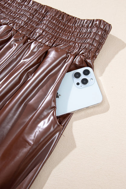 Braune gesmokte leder-skinny-hose mit hoher taille