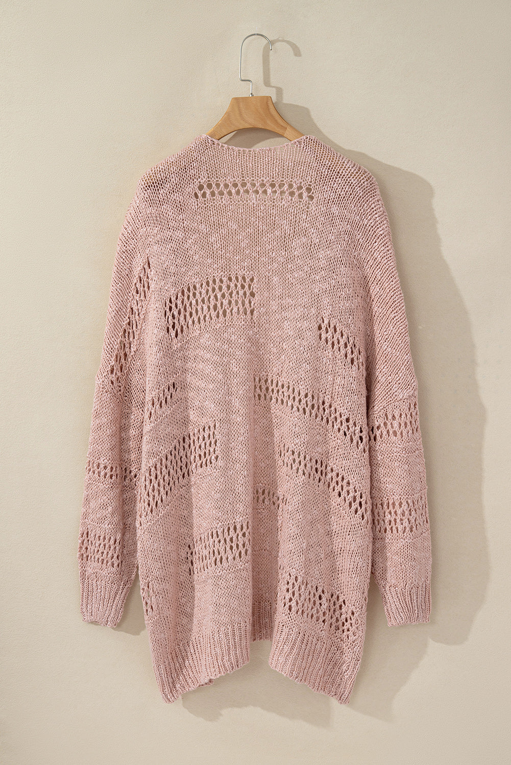 Rosa lässige strickjacke mit dolman-ärmeln und lochmuster