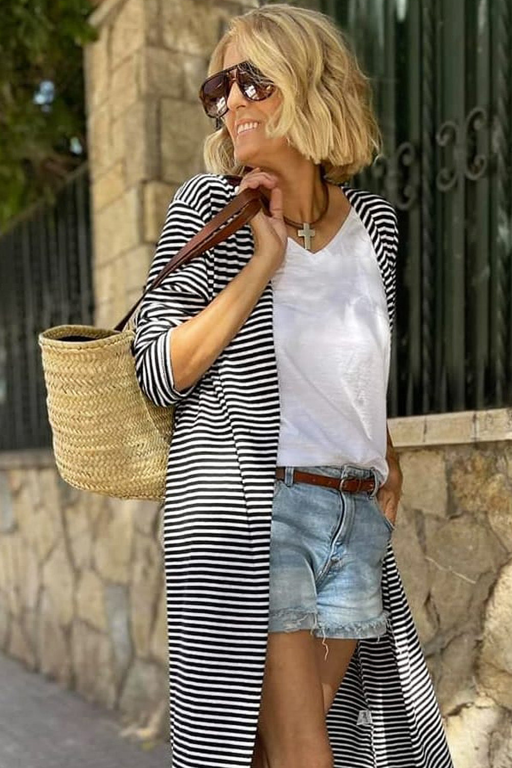 Gestreifte lange strickjacke mit offener vorderseite