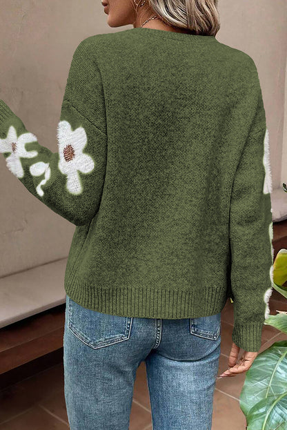 Moosgrüner pullover mit blumenärmeln und hängeschultern