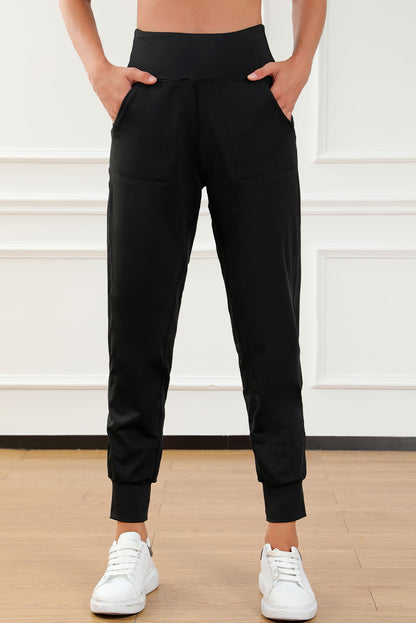 Schwarze jogginghose mit hoher taille und offener naht