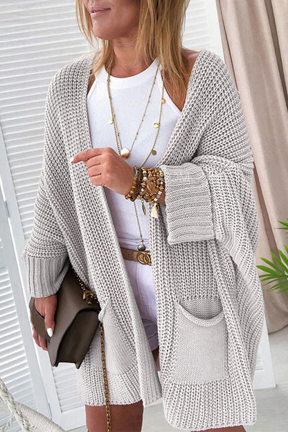 Grauer übergroßer pullover mit umgeschlagenen ärmeln cardigan