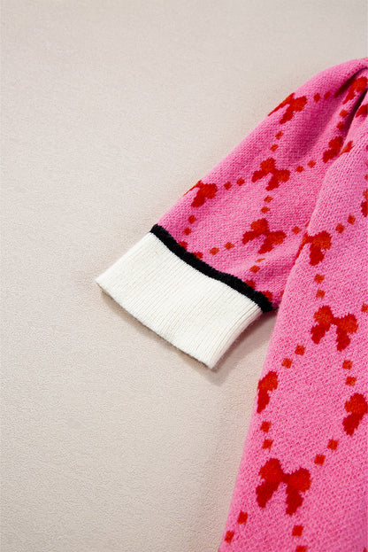 Rosa kurzarm-pullover mit schleifendruck