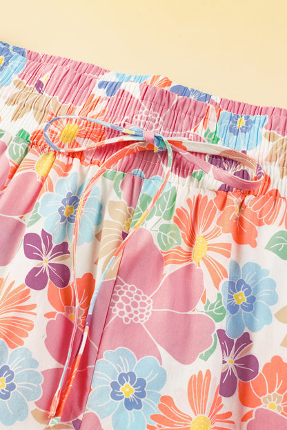 Rosa floral smocked taille lose hose