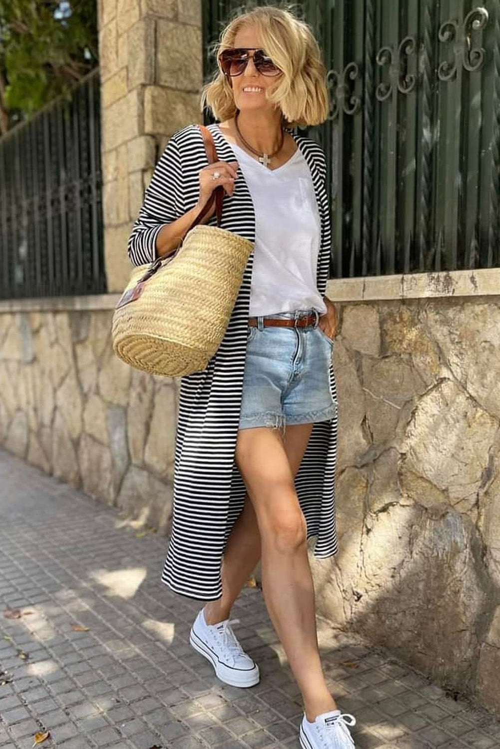 Gestreifte lange strickjacke mit offener vorderseite