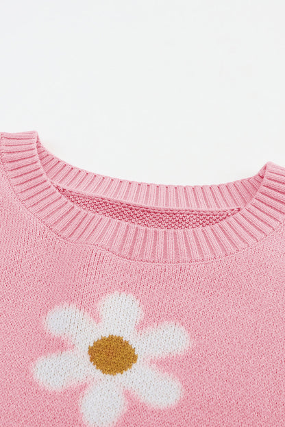 Rosa pullover mit blumenmuster und schultern