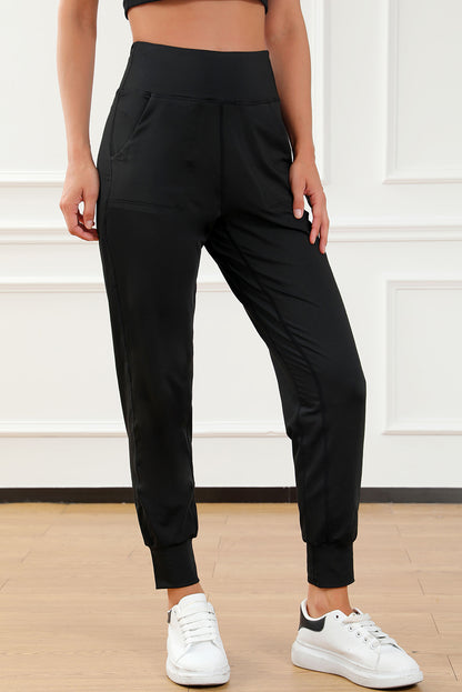 Schwarze jogginghose mit hoher taille und offener naht