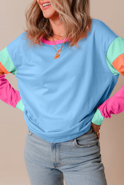 Dunkelblaues colorblock patchwork-langarm-top mit lockeren ärmeln