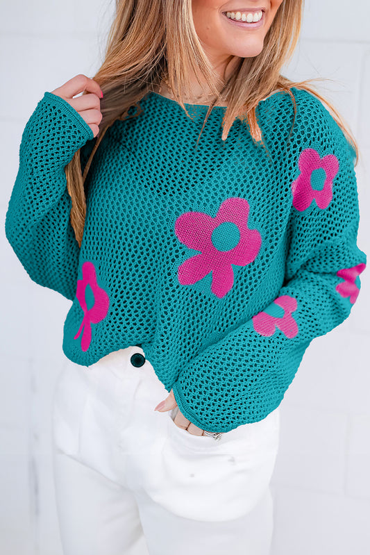 Meergrüner pullover mit großer blume und hohlen schultern aus strick