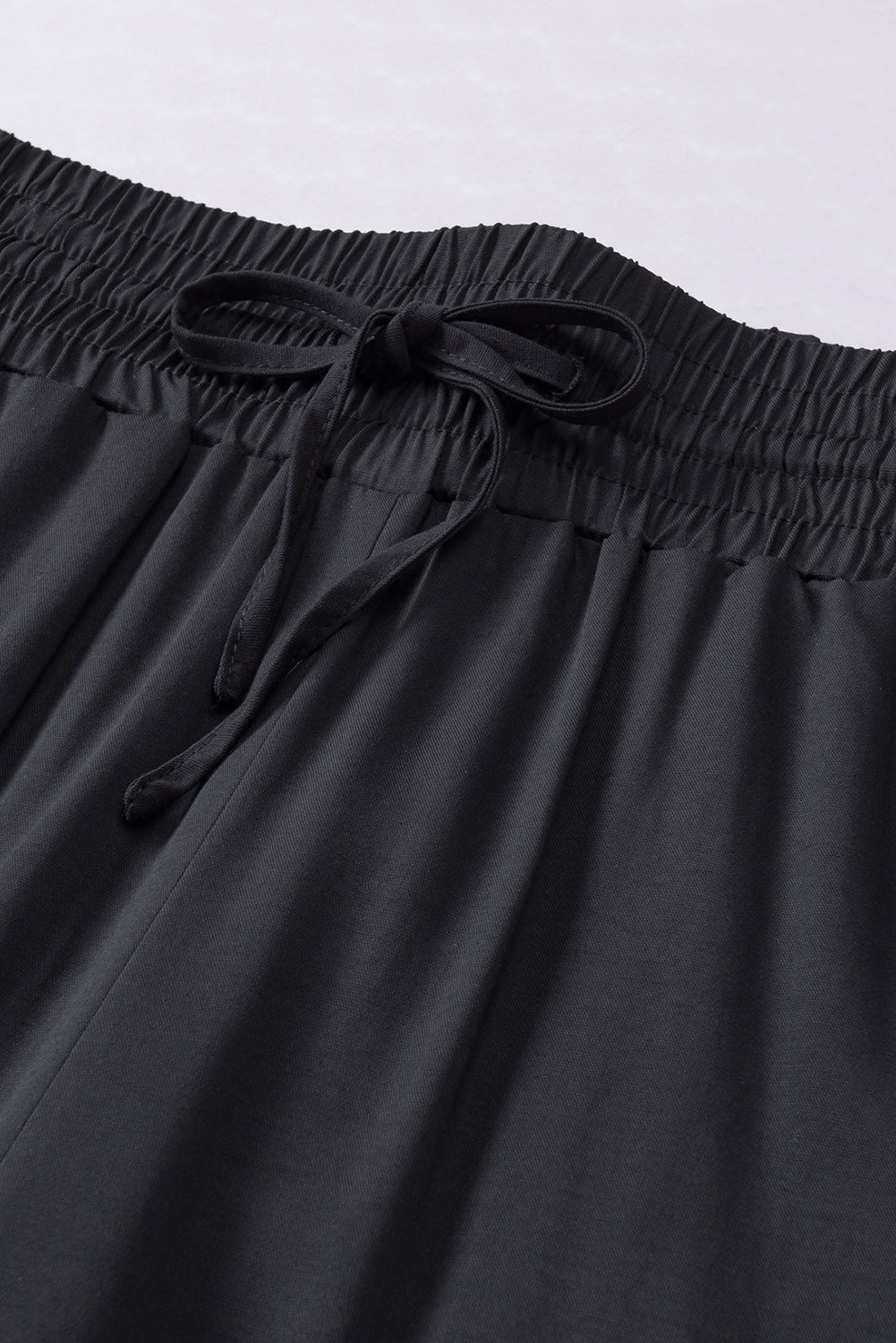 Schwarzer kordelzug elastische taille lässige hose mit weitem bein