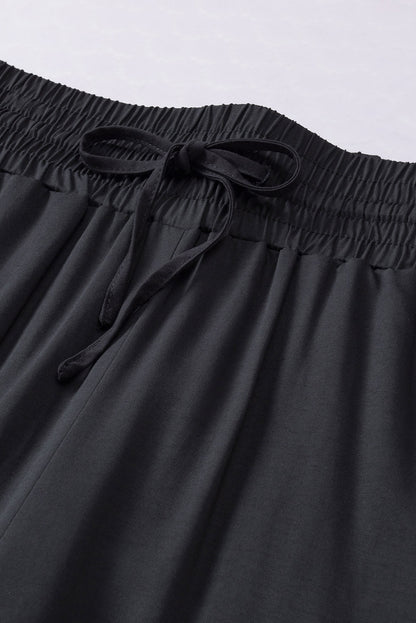 Schwarzer kordelzug elastische taille lässige hose mit weitem bein