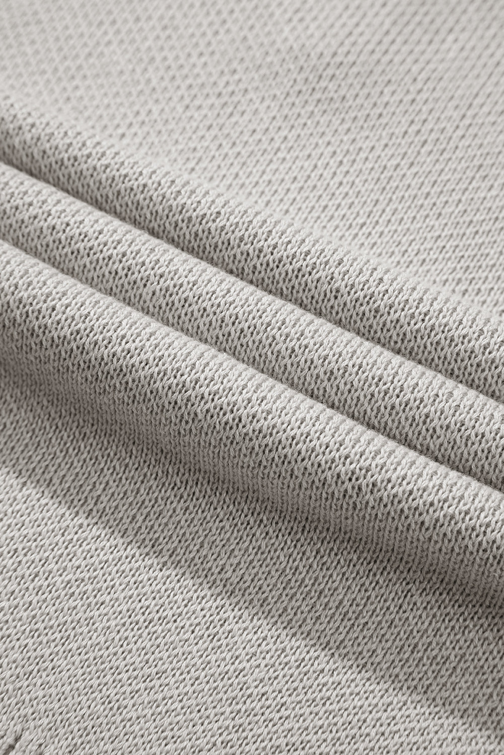 Hellgrauer quarter zip pullover mit kurzen fledermausärmeln