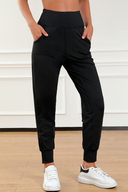 Schwarze jogginghose mit hoher taille und offener naht