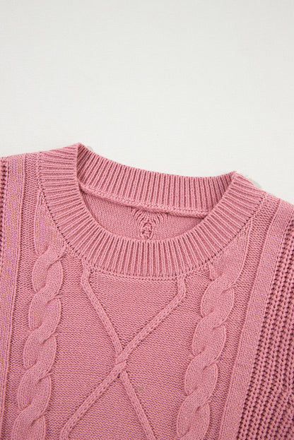 Rosa kabelstrickpullover mit gemischter struktur und kurzen ärmeln