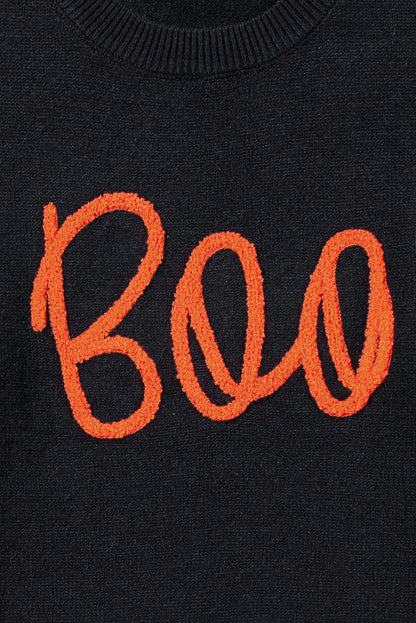 Schwarzer boo strickpullover mit geripptem rand und schultern