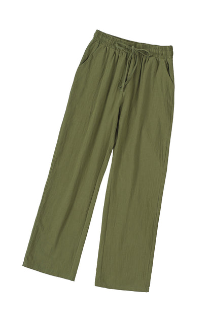 Grüne hose mit kordelzug und elastischer taille lange, gerade hosenbeine