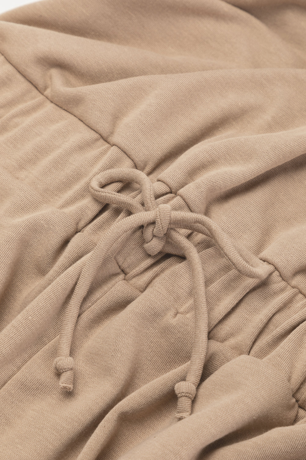 Light french beige cap sleeve open back drawstring jogger jumpsuit
