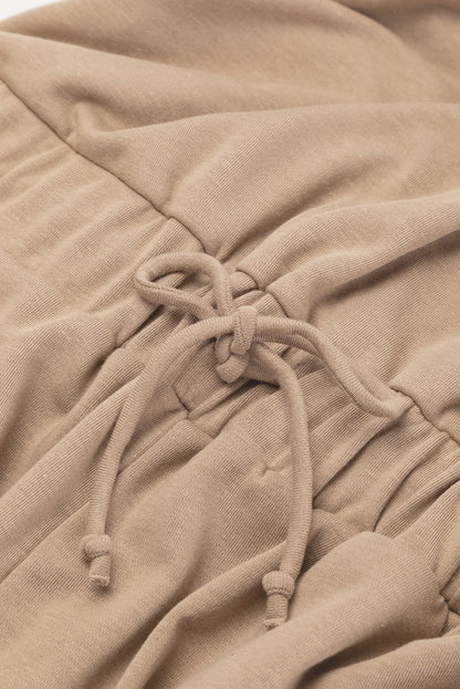 Light french beige cap sleeve open back drawstring jogger jumpsuit