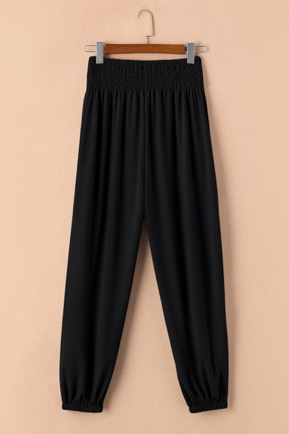 Schwarze gesmokte jogginghose mit hoher taille