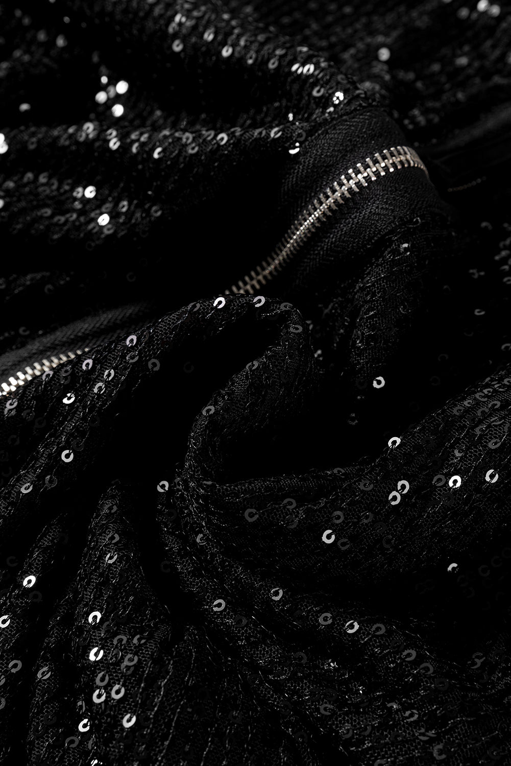 Schwarze paillettenjacke mit rundhalsausschnitt und langen ärmeln