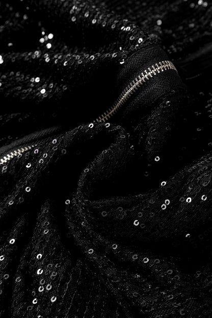 Schwarze paillettenjacke mit rundhalsausschnitt und langen ärmeln