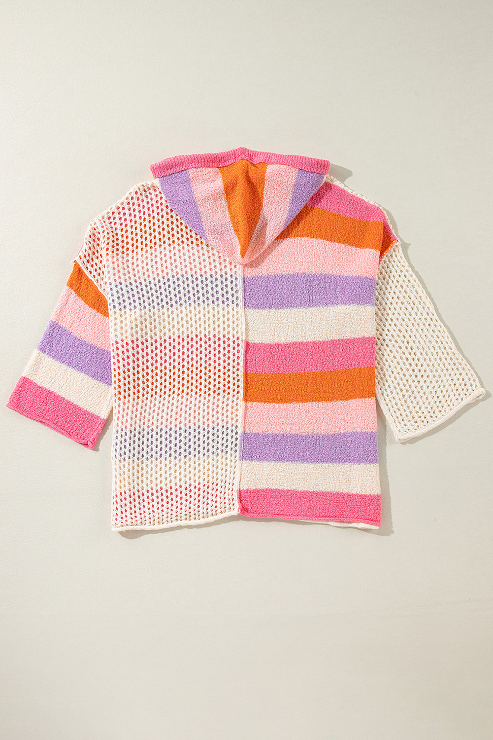 Rosa übergroßer colorblock-pullover mit v-ausschnitt und kapuze
