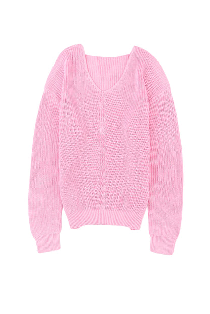 Rosa pullover mit v-ausschnitt aus rippenstrick