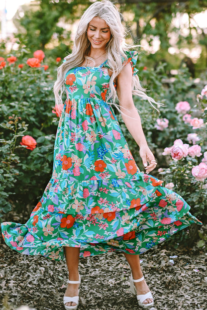 Grünes ärmelloses maxikleid mit blumendruck und rüschenbesatz