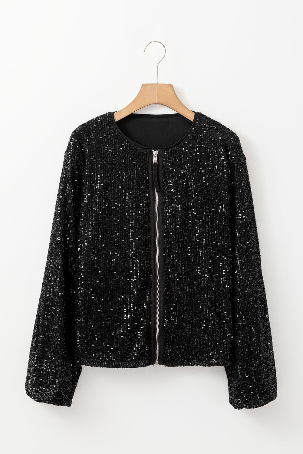 Schwarze paillettenjacke mit rundhalsausschnitt und langen ärmeln