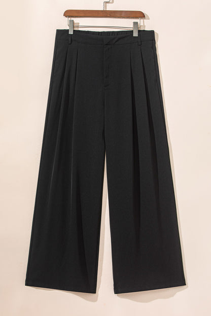 Schwarze plissierte elegante hose mit weitem bein