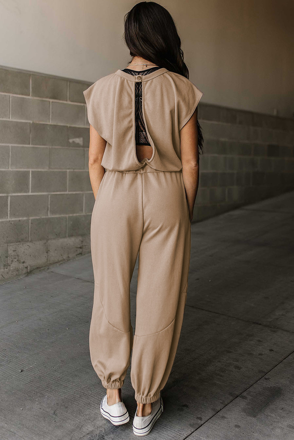 Light french beige cap sleeve open back drawstring jogger jumpsuit