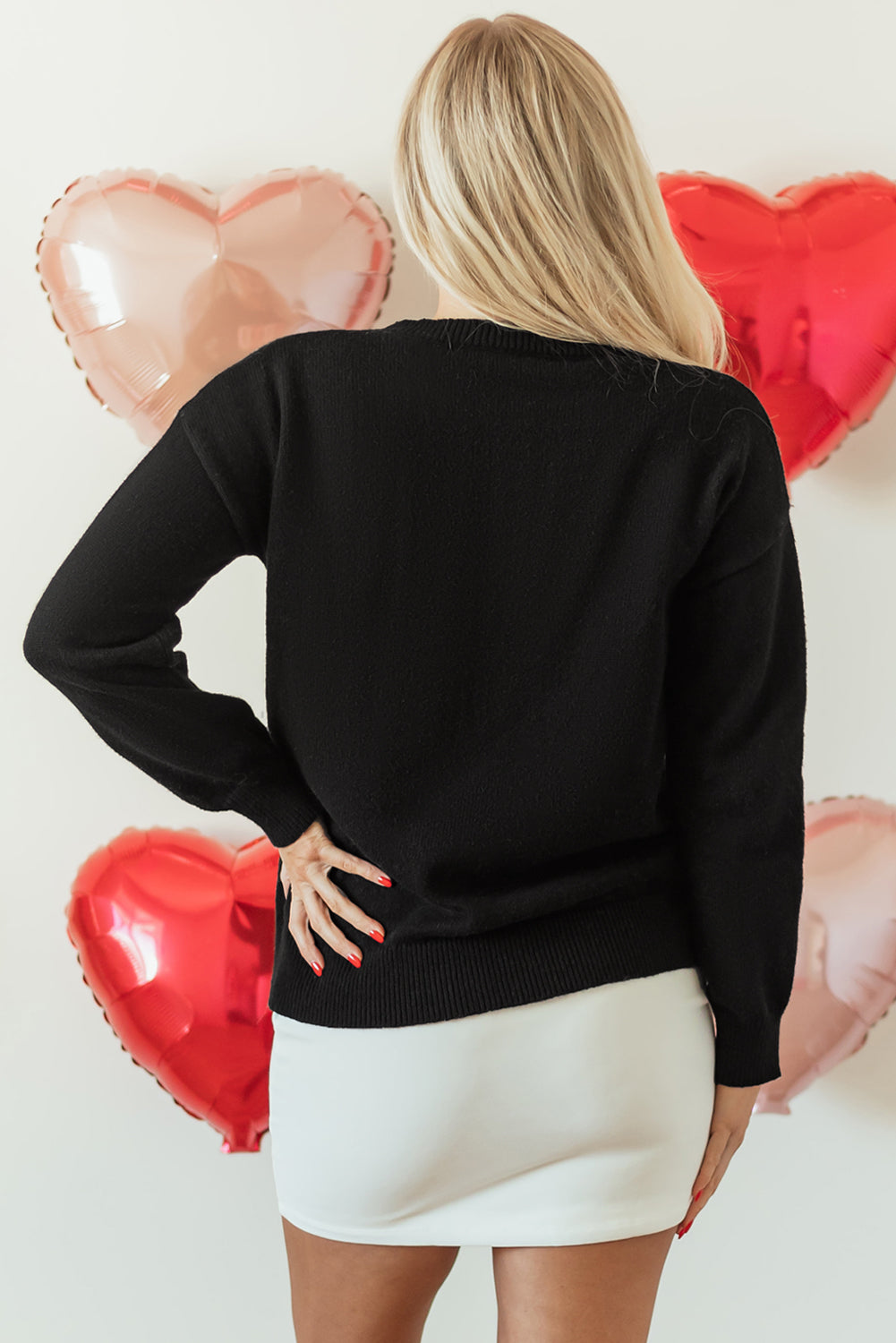 Schwarzer xoxo glitter print rundhalsausschnitt casual pullover