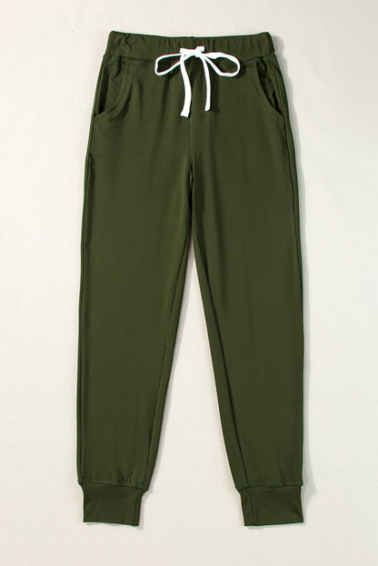 Moosgrüne jogginghose mit kordelzug an der taille