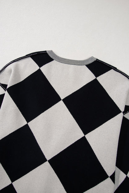 Schwarzer colorblock-cardigan mit geknöpften schultern und lockerer passform