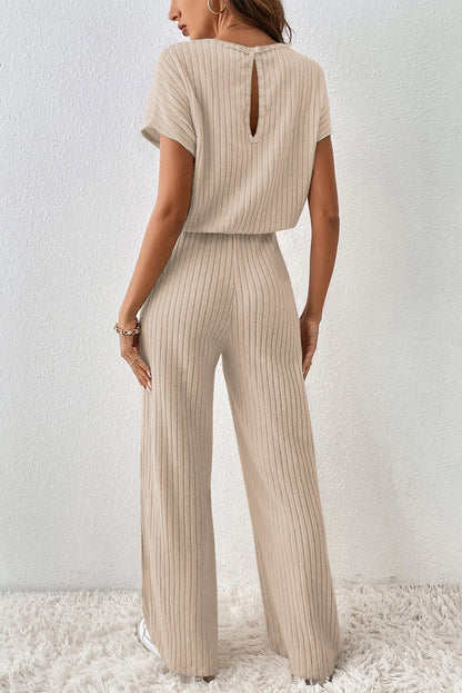 Pergamentfarbener gerippter kurzarm-overall mit weitem bein