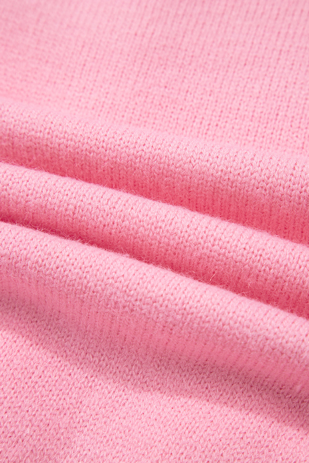 Rosa niedliche strickjacke mit blumenmuster und knopfleiste