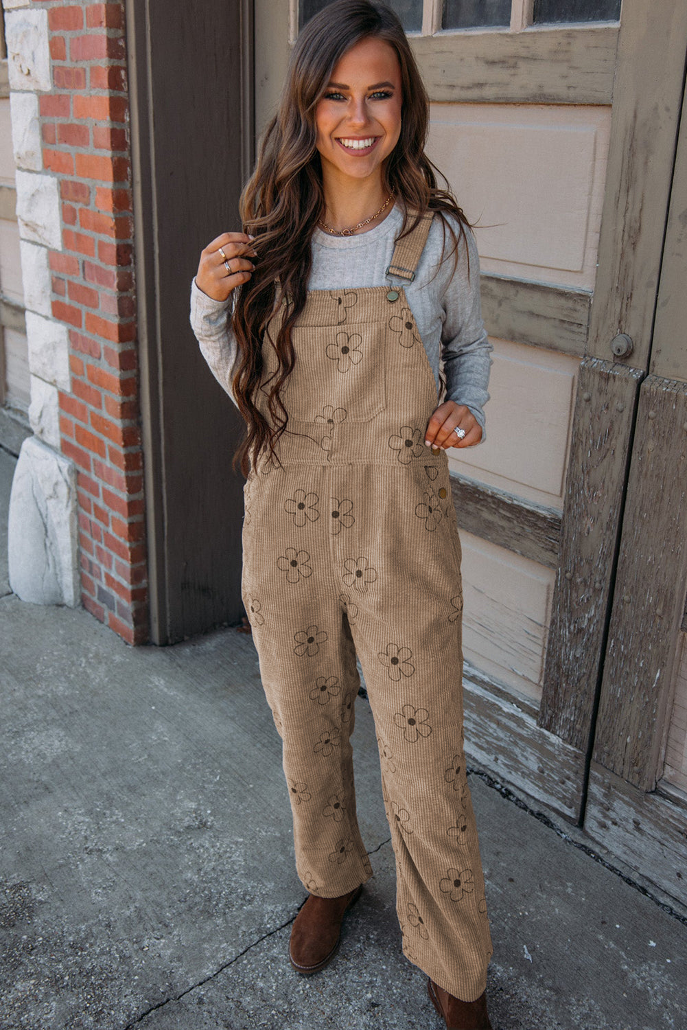 Khakifarbener kord-overall mit blumendruck