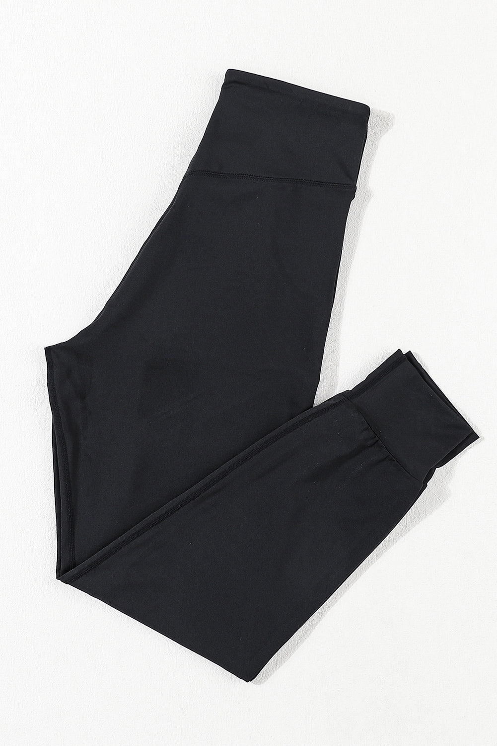Schwarze jogginghose mit hoher taille und offener naht
