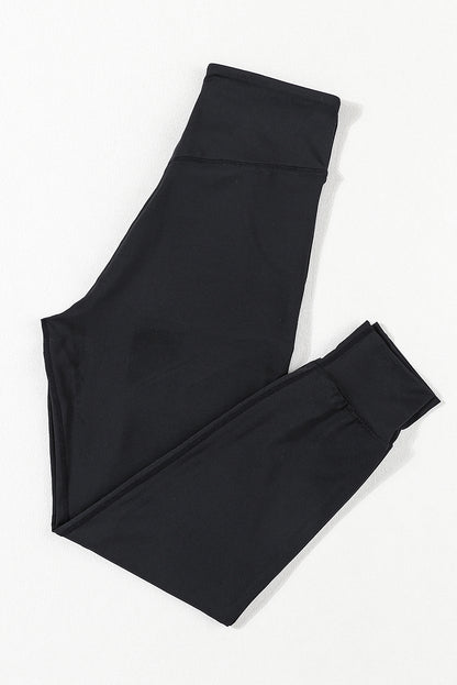 Schwarze jogginghose mit hoher taille und offener naht